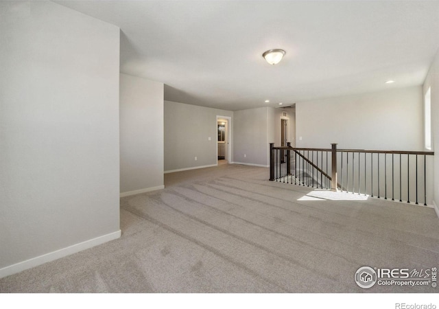 13 Chipeta Way, Lochbuie, CO 80603 - carpeted spare room with recessed lighting