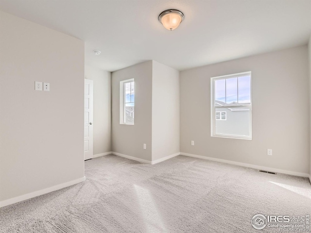 13 Chipeta Way, Lochbuie, CO 80603 - spare room featuring carpet and baseboards