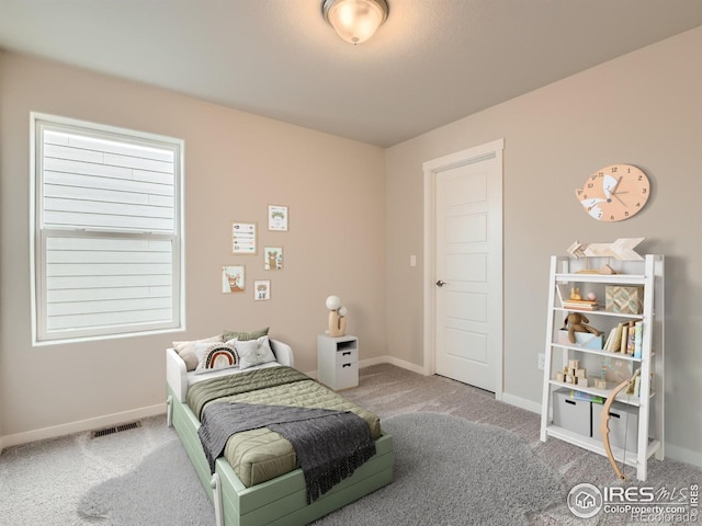 13 Chipeta Way, Lochbuie, CO 80603 - carpeted bedroom featuring baseboards