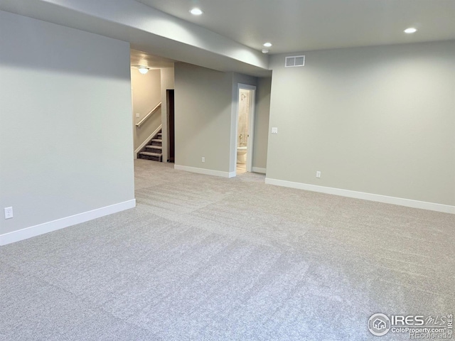 13 Chipeta Way, Lochbuie, CO 80603 - finished below grade area featuring recessed lighting, light colored carpet, and stairs