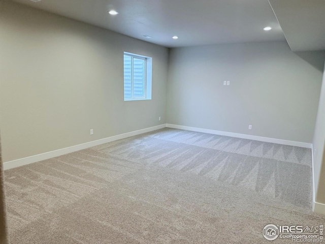 13 Chipeta Way, Lochbuie, CO 80603 - carpeted empty room with baseboards and recessed lighting