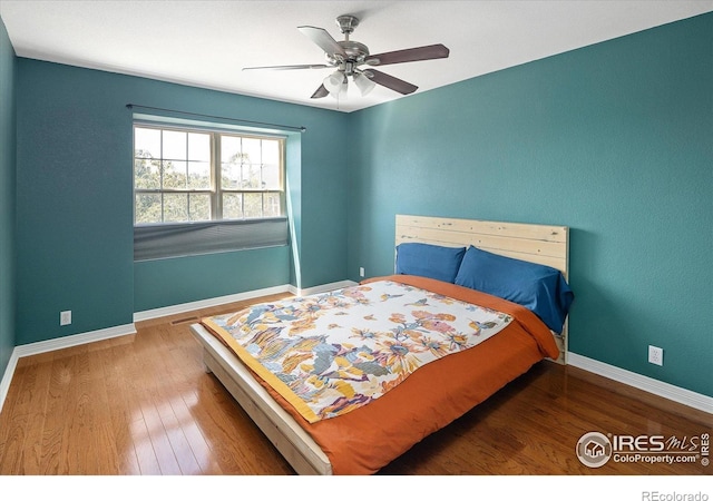 691 Tamarisk Ct, Louisville, CO 80027 - bedroom featuring wood finished floors and ceiling fan