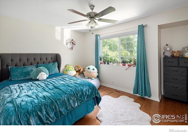 691 Tamarisk Ct, Louisville, CO 80027 - bedroom with wood finished floors and ceiling fan