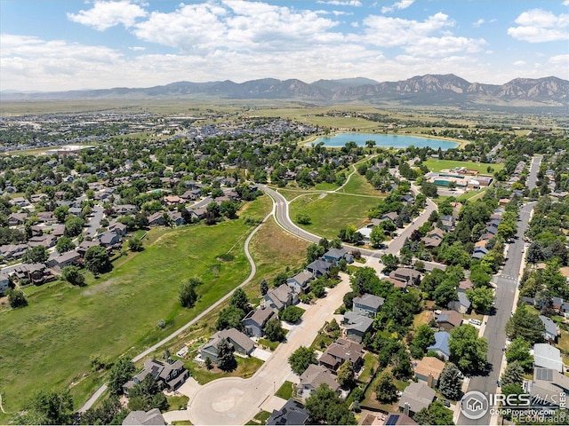 691 Tamarisk Ct, Louisville, CO 80027 - aerial perspective of suburban area with a water and mountain view