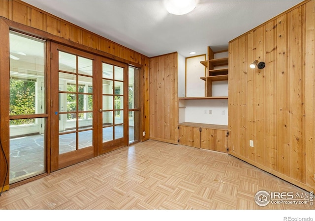 2940 9th St, Boulder, CO 80304 - unfurnished room with wood walls and french doors