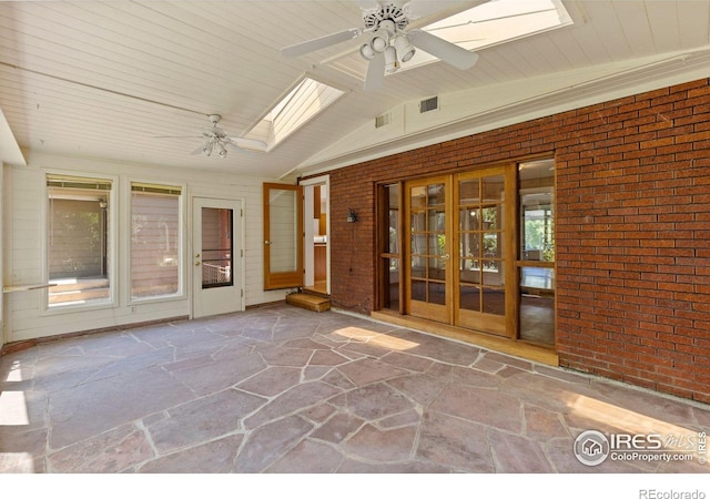 2940 9th St, Boulder, CO 80304 - unfurnished sunroom with french doors, a skylight, and vaulted ceiling
