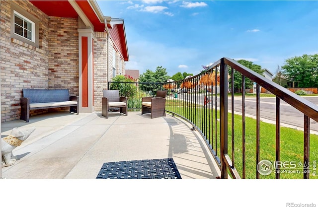555 S 17th Ave, Brighton, CO 80601 - patio / terrace with a yard