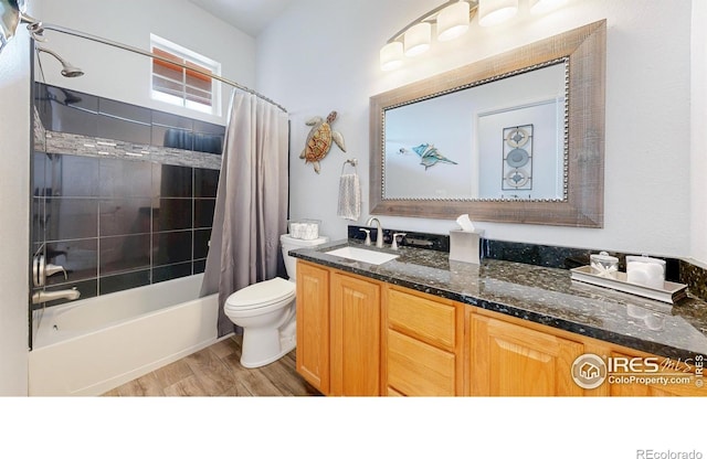 555 S 17th Ave, Brighton, CO 80601 - bathroom with shower / tub combo, vanity, and wood finished floors