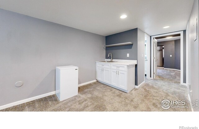 555 S 17th Ave, Brighton, CO 80601 - indoor wet bar with light carpet and recessed lighting