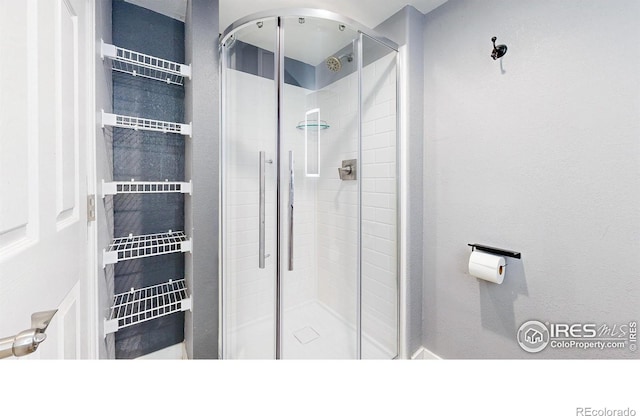 555 S 17th Ave, Brighton, CO 80601 - full bathroom featuring a shower stall