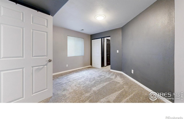 555 S 17th Ave, Brighton, CO 80601 - unfurnished bedroom with carpet flooring and a closet