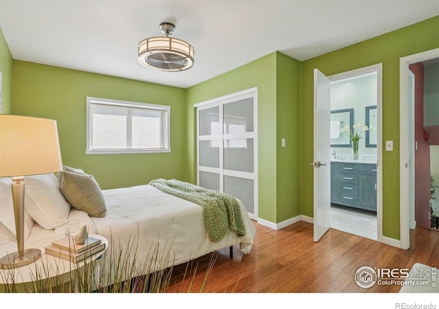 1430 Kennedy Ave, Louisville, CO 80027 - bedroom featuring wood finished floors and baseboards