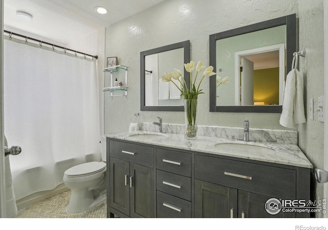 1430 Kennedy Ave, Louisville, CO 80027 - full bath featuring double vanity, shower / tub combo, tile patterned floors, and a textured wall