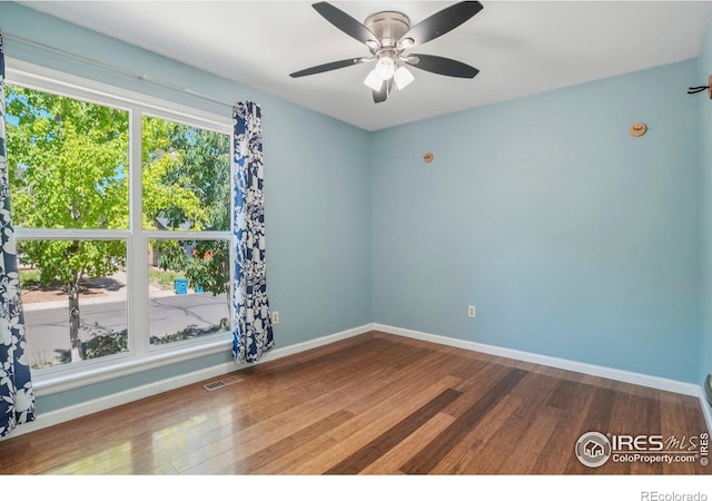 1430 Kennedy Ave, Louisville, CO 80027 - empty room with wood finished floors and ceiling fan