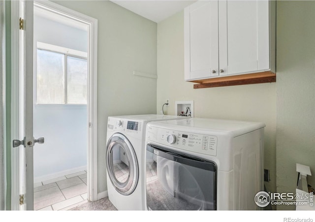 1430 Kennedy Ave, Louisville, CO 80027 - washroom featuring cabinet space and washer and dryer