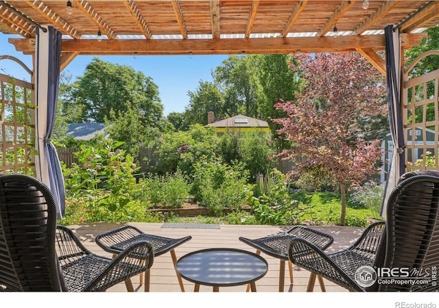 1430 Kennedy Ave, Louisville, CO 80027 - view of patio / terrace featuring a wooden deck, a pergola, and view of scattered trees