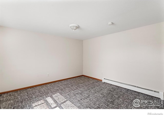 612 20th St, Greeley, CO 80631 - empty room with baseboard heating, carpet, and a smoke detector