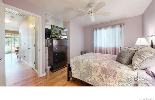 7294 Tamarisk Dr, Fort Collins, CO 80528 - bedroom featuring light wood-type flooring and ceiling fan