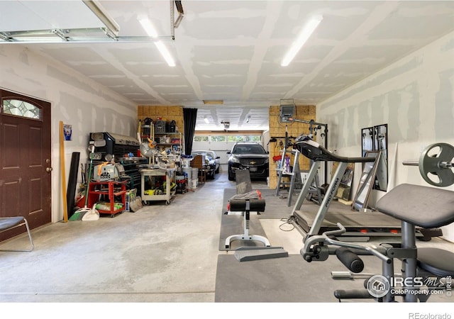 144 Placer Ave, Longmont, CO 80504 - gym with a garage