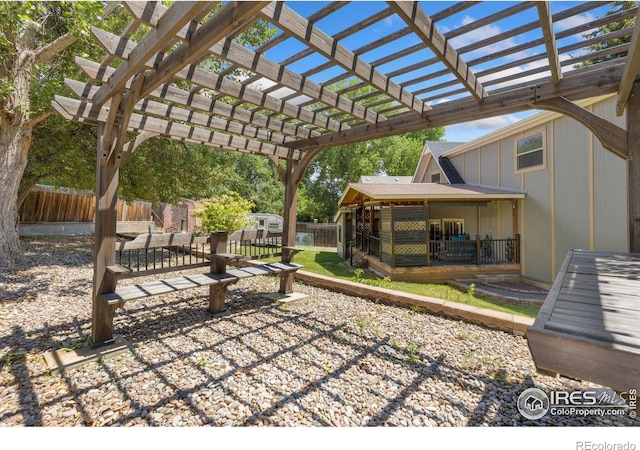 144 Placer Ave, Longmont, CO 80504 - fenced backyard with a pergola