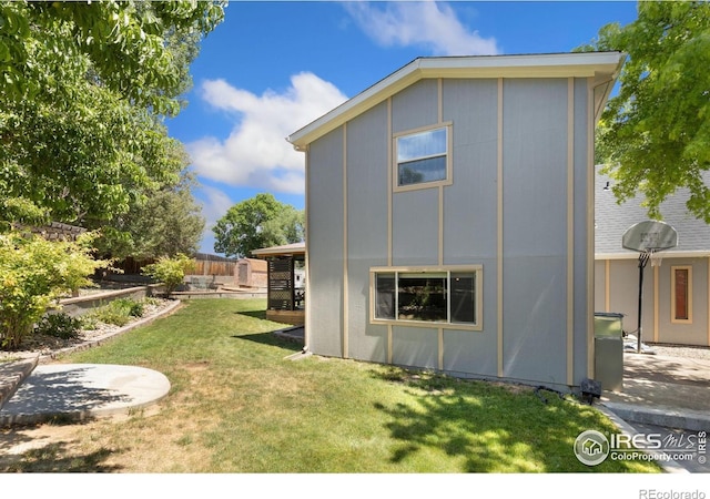 144 Placer Ave, Longmont, CO 80504 - back of house featuring a patio