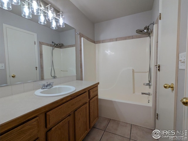 3705 Dove Ln, Evans, CO 80620 - full bath with vanity, shower / bath combination, and tile patterned floors