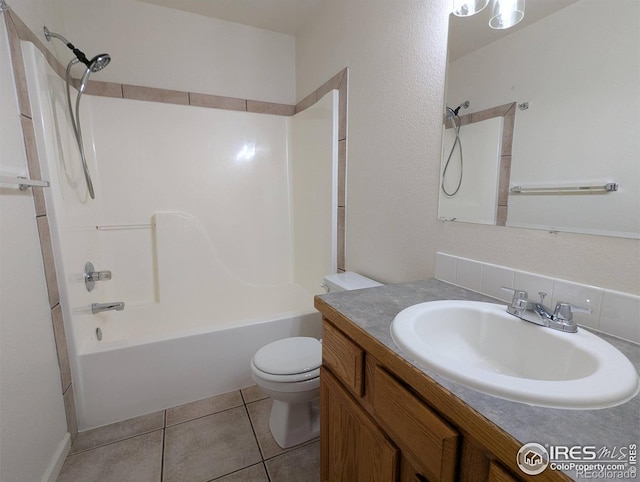 3705 Dove Ln, Evans, CO 80620 - full bathroom with vanity, shower / washtub combination, and tile patterned flooring