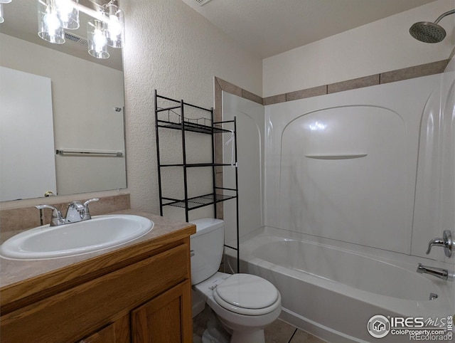 3705 Dove Ln, Evans, CO 80620 - full bathroom with a textured wall, washtub / shower combination, and vanity