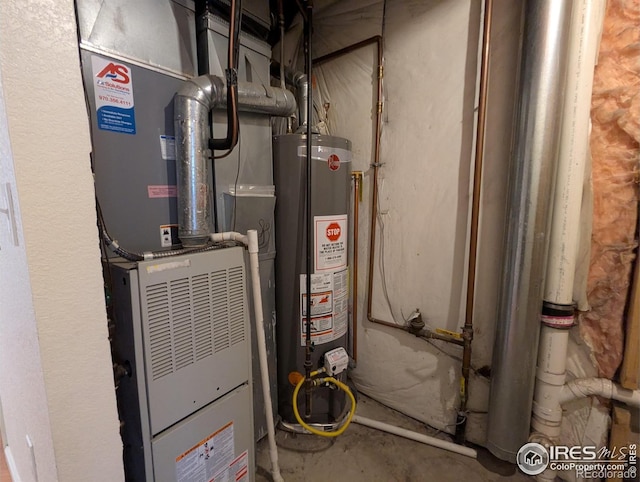 3705 Dove Ln, Evans, CO 80620 - utility room featuring gas water heater and heating unit