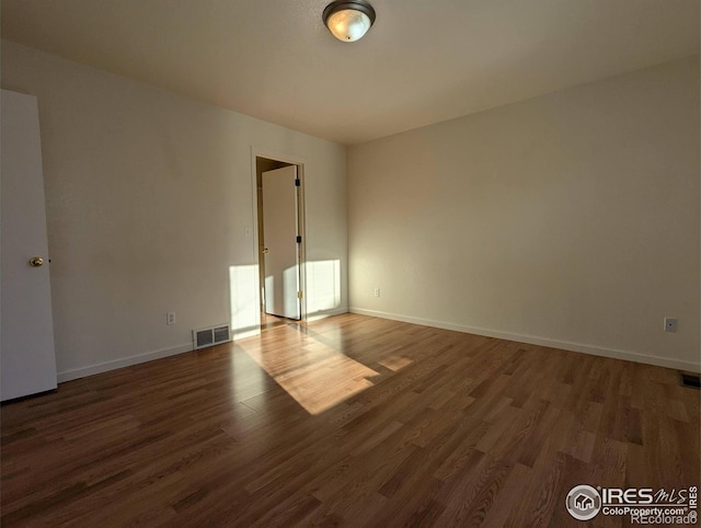 3705 Dove Ln, Evans, CO 80620 - empty room with wood finished floors