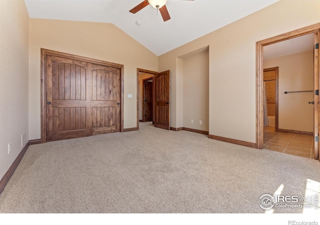8276 Blackwood Dr, Windsor, CO 80550 - unfurnished bedroom featuring carpet flooring, lofted ceiling, ensuite bathroom, and ceiling fan