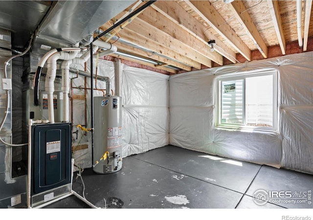 1228 104th Avenue Ct, Greeley, CO 80634 - below grade area featuring gas water heater and heating unit