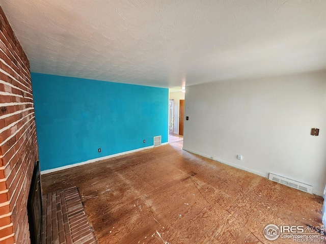 1107 Delmar St, Sterling, CO 80751 - unfurnished room featuring baseboards