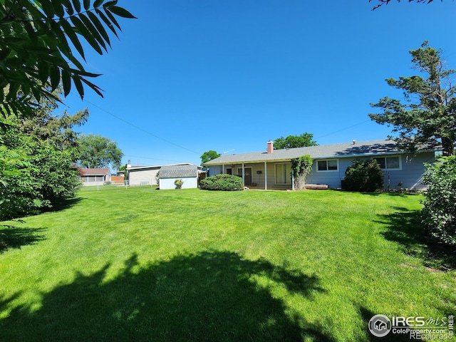 1107 Delmar St, Sterling, CO 80751 - view of grassy yard