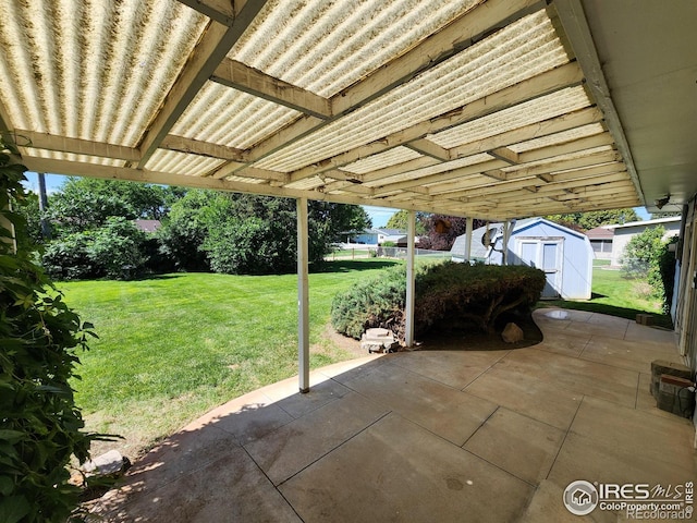 1107 Delmar St, Sterling, CO 80751 - view of patio with a storage unit
