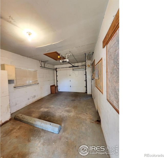 1107 Delmar St, Sterling, CO 80751 - garage featuring a garage door opener