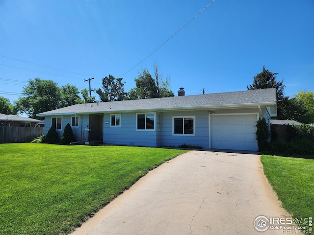 1107 Delmar St, Sterling, CO 80751 - single story home with an attached garage and concrete driveway