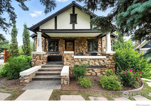 2958 6th St, Boulder, CO 80304 - view of front of property with stone siding and covered porch