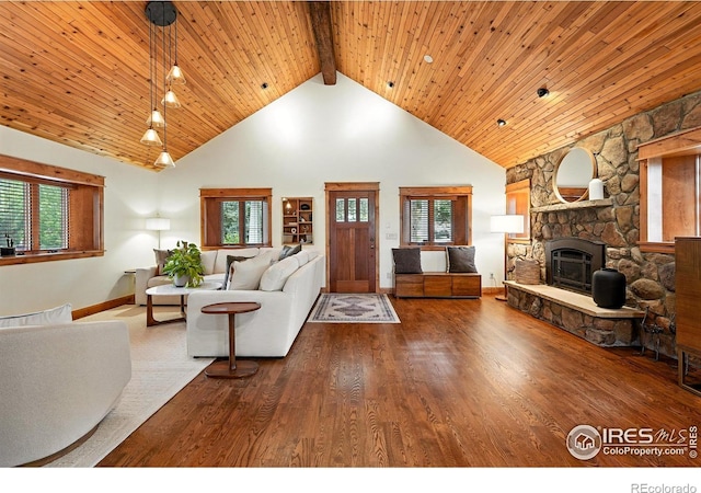 2958 6th St, Boulder, CO 80304 - living room featuring high vaulted ceiling, a fireplace, healthy amount of natural light, wood finished floors, and a wood ceiling with exposed beams