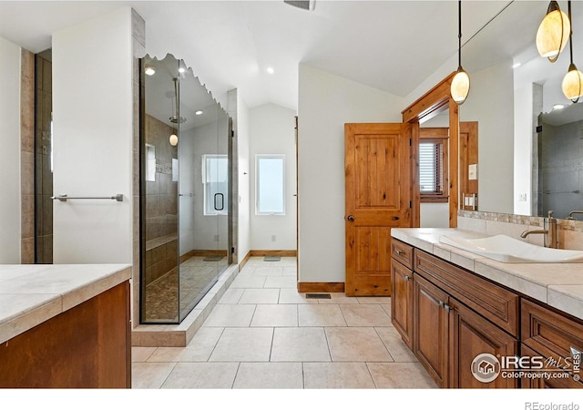 2958 6th St, Boulder, CO 80304 - full bath with a shower stall, vaulted ceiling, vanity, recessed lighting, and tile patterned floors