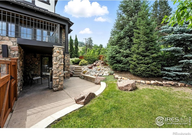 2958 6th St, Boulder, CO 80304 - view of grassy yard with a balcony