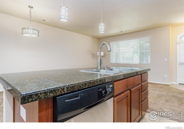 15233 W 65th Ave Unit C, Arvada, CO 80007 - kitchen with stainless steel dishwasher, light colored carpet, brown cabinets, and pendant lighting