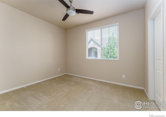 15233 W 65th Ave Unit C, Arvada, CO 80007 - unfurnished bedroom featuring light colored carpet and a ceiling fan