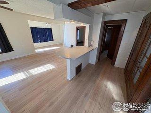 709 S 2nd Ave S, Sterling, CO 80751 - empty room featuring wood finished floors and ceiling fan