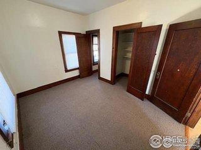 709 S 2nd Ave S, Sterling, CO 80751 - unfurnished bedroom with baseboards