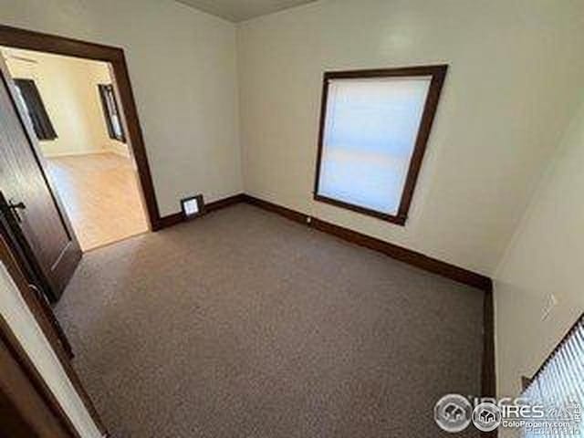 709 S 2nd Ave S, Sterling, CO 80751 - spare room with healthy amount of natural light