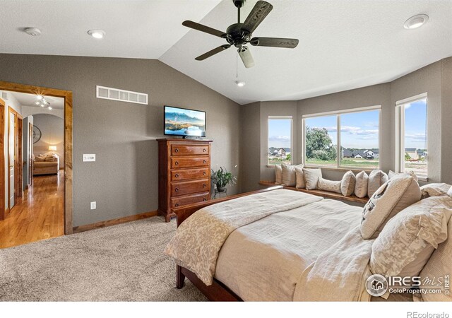 1787 Gore Creek Ct, Windsor, CO 80550 - carpeted bedroom with lofted ceiling, a ceiling fan, and recessed lighting