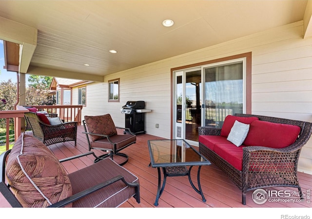 1787 Gore Creek Ct, Windsor, CO 80550 - wooden deck featuring a grill and an outdoor hangout area