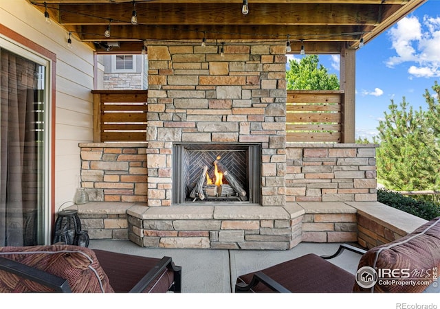 1787 Gore Creek Ct, Windsor, CO 80550 - detailed view of an outdoor stone fireplace
