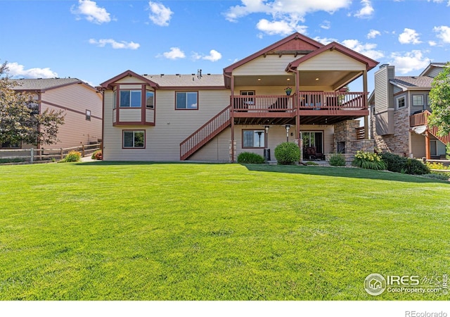 1787 Gore Creek Ct, Windsor, CO 80550 - rear view of property featuring stairway and a deck